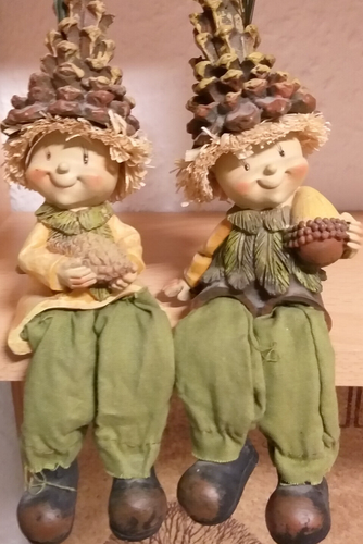 Autumn decoration edge stool dwarfs with forest fruits